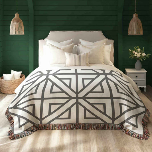 Modern Geometric woven blanket with geometric pattern styled for layered home decor