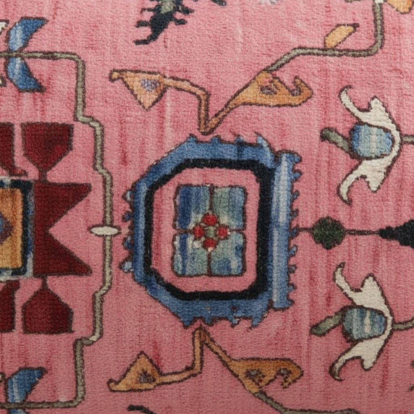 Anatolian Inspired throw pillow with rug-style pattern styled on a sofa or bed