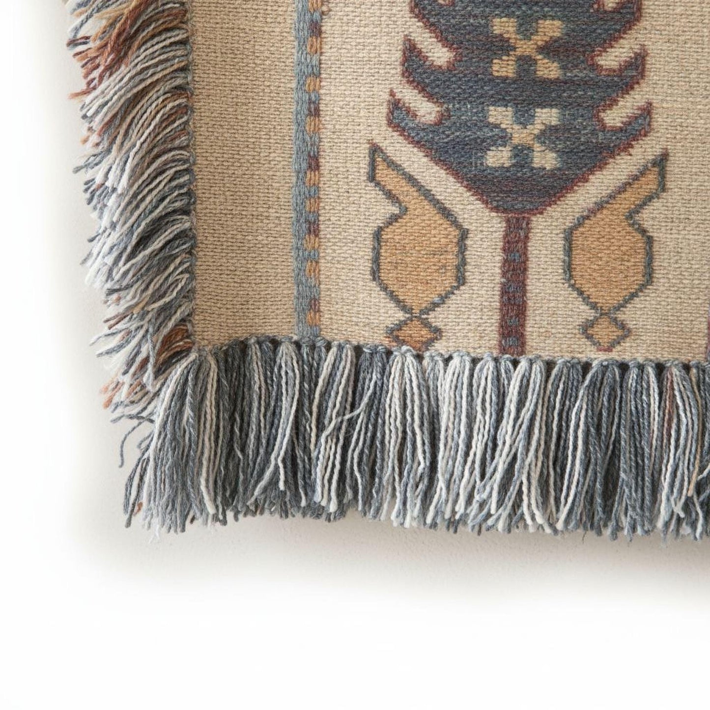 Caucasian Rug Inspired woven wall tapestry with geometric pattern styled as textile wall decor