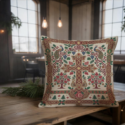 Armenian Christmas woven pillow with filling included. A central ornamental cross and branching pomegranate trees stand against a cream background, with red fruit, green leaves and a burgundy-and-gold border.