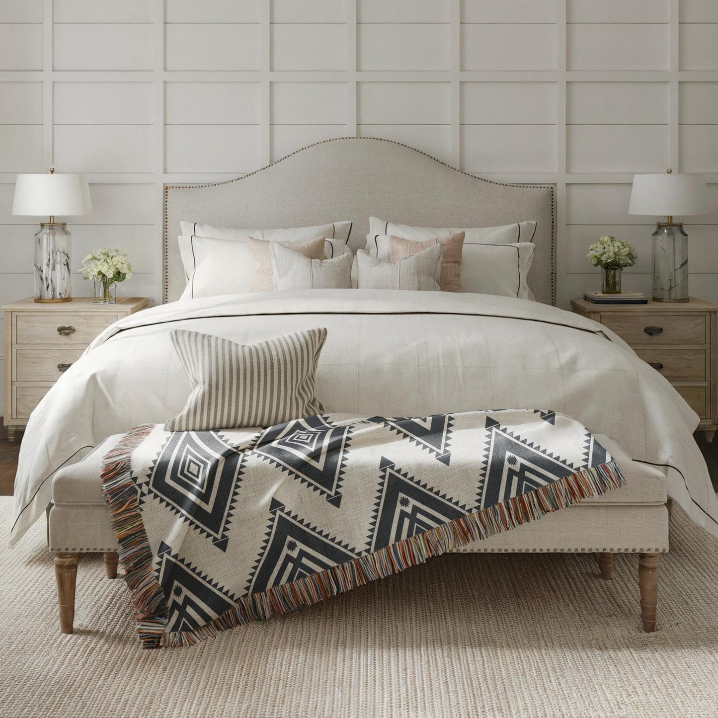 Southwestern woven blanket with geometric pattern styled for layered home decor