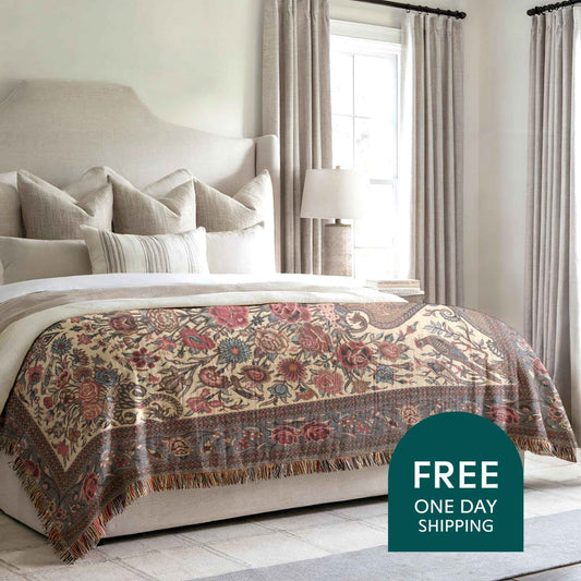 Moroccan Inspired woven blanket with floral pattern styled for layered home decor