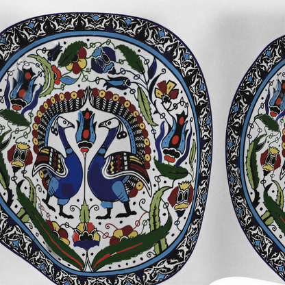 Close view of the oval medallions holding paired blue peacocks with green leaves