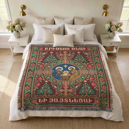 Armenian Nativity blanket over a bed with white pillows and flowers on both nightstands
