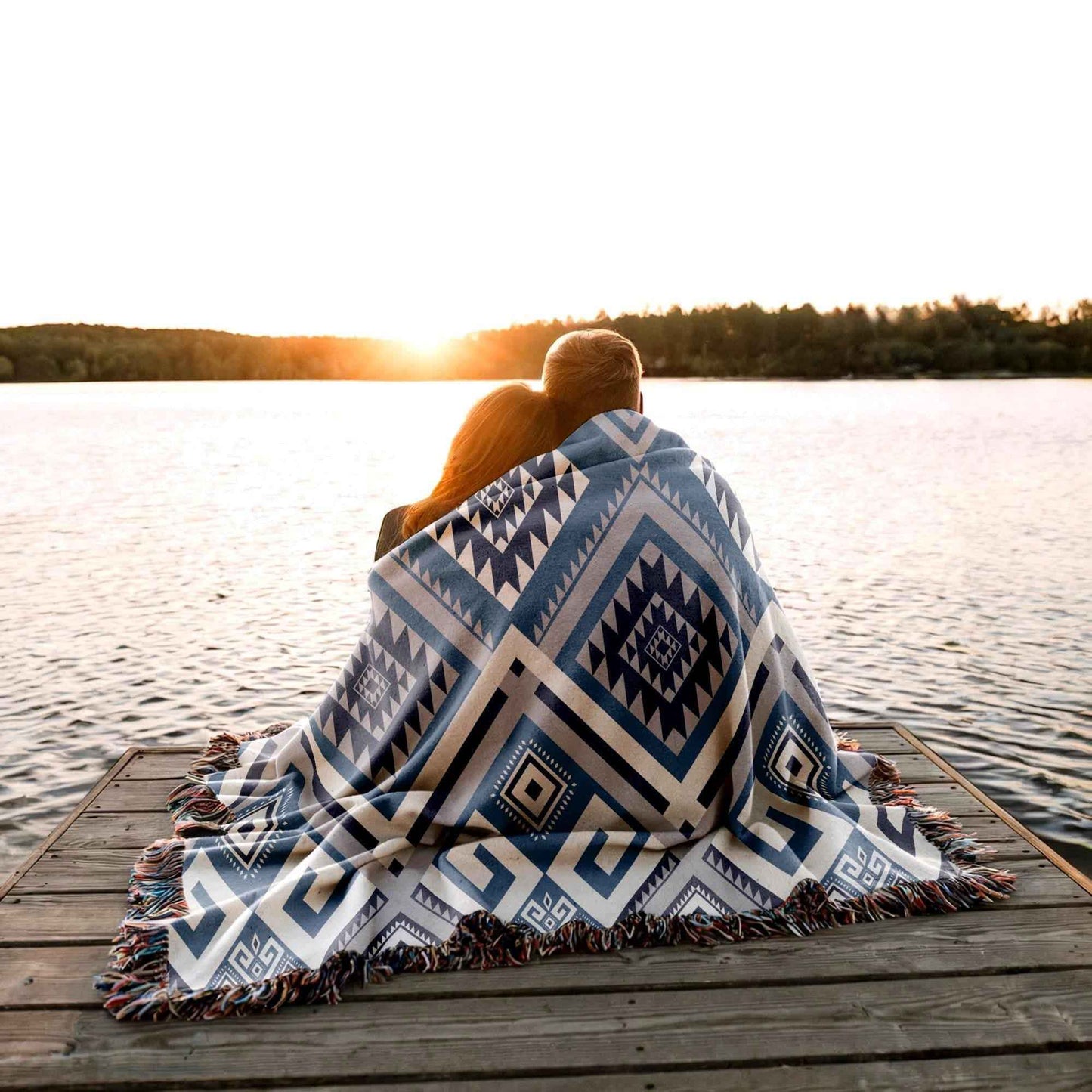 Southwestern outdoor woven throw blanket with geometric pattern for patio styling