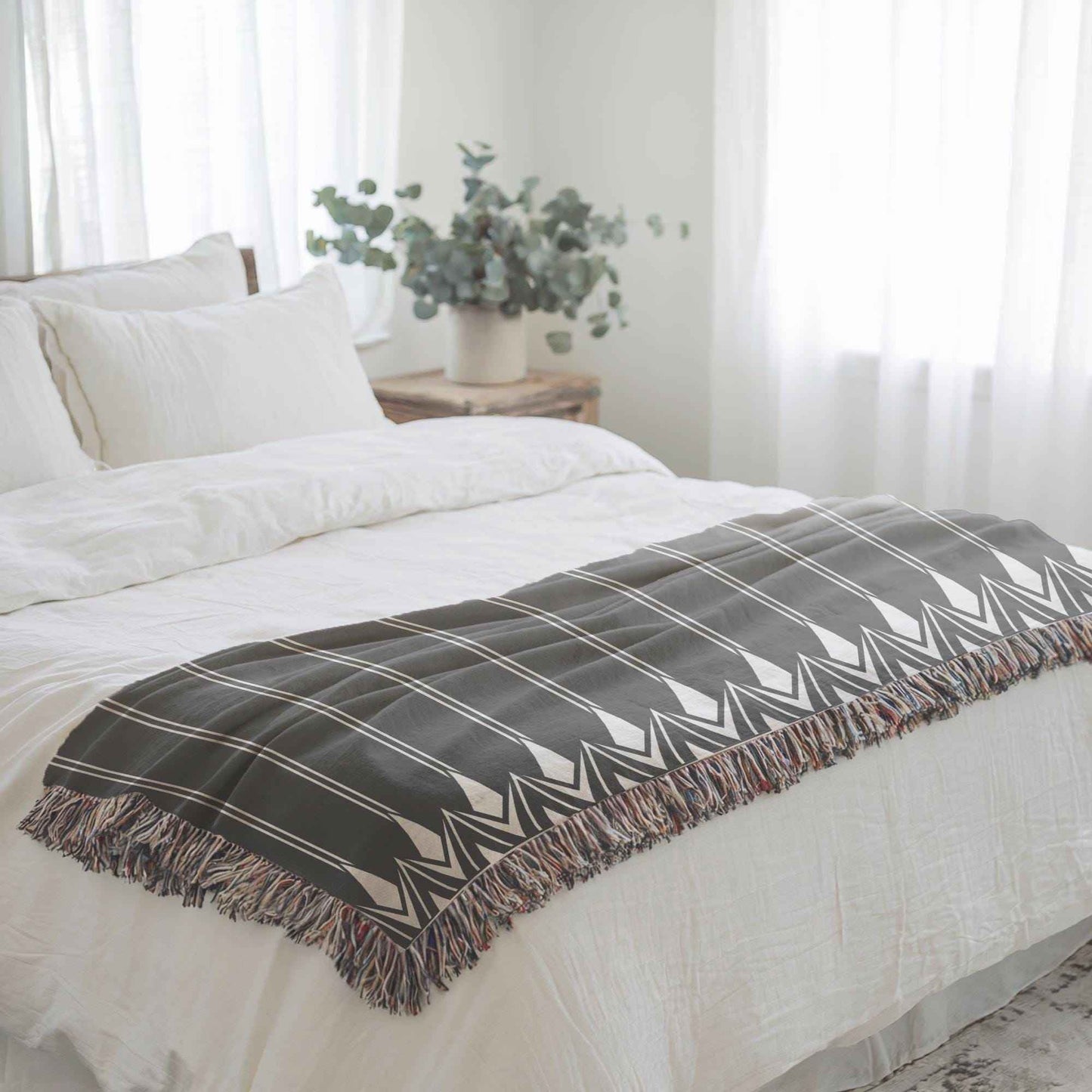 Modern Geometric woven blanket with geometric pattern styled for layered home decor
