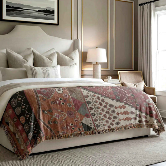 Southwestern woven blanket with geometric pattern styled for layered home decor