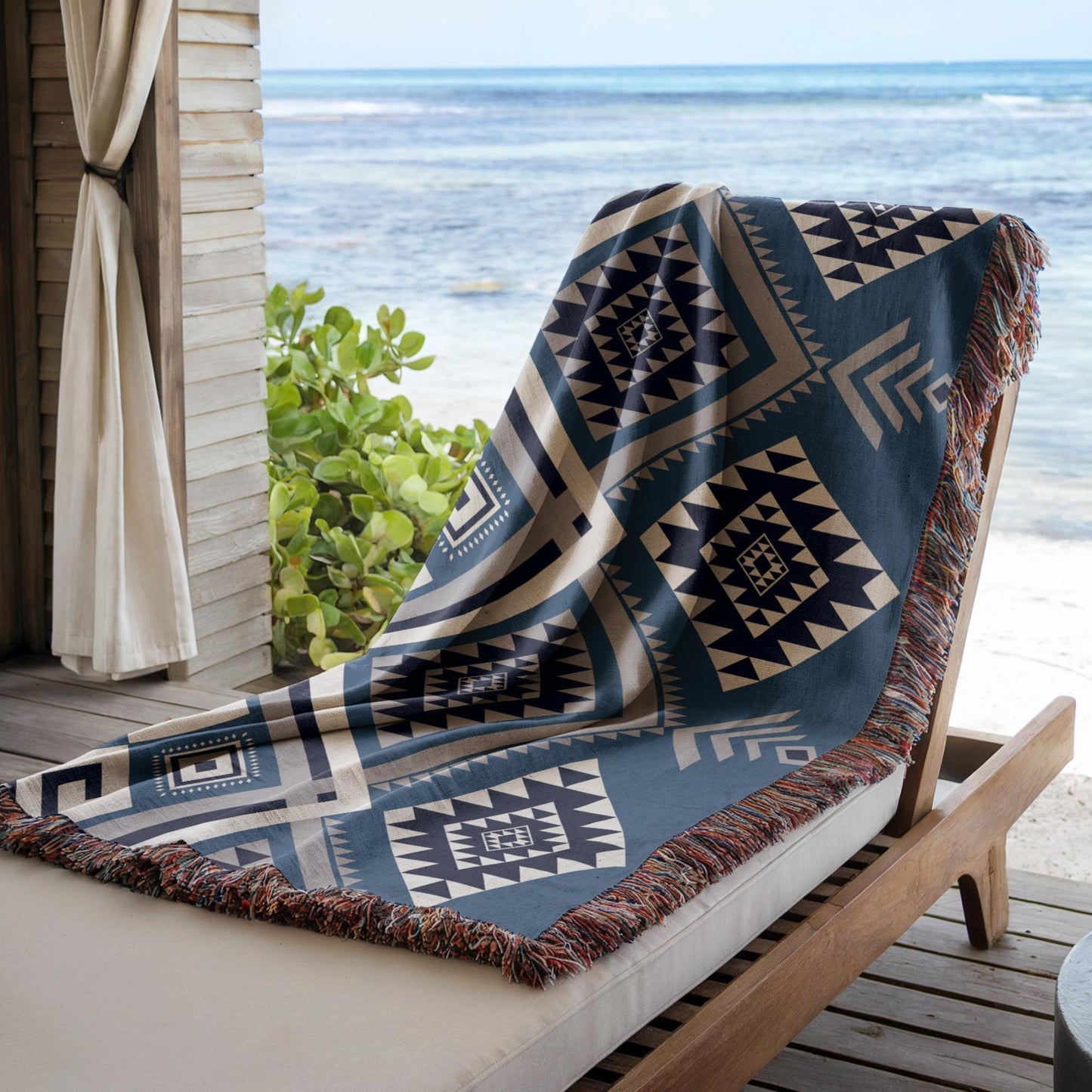 Southwestern outdoor woven throw blanket with geometric pattern for patio styling