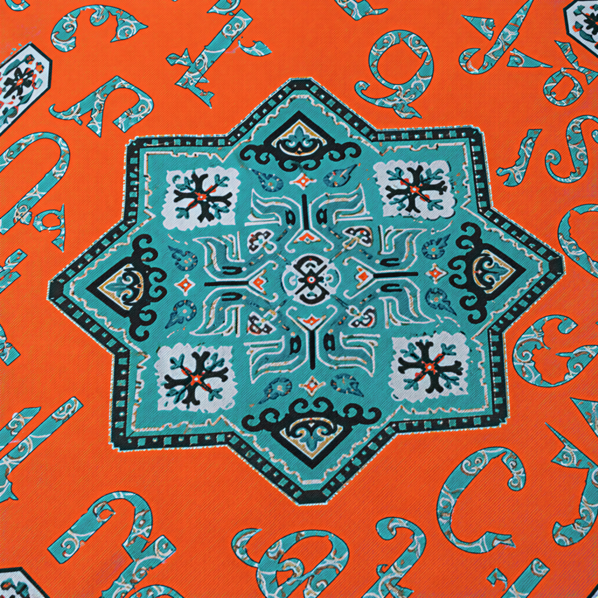 Close view of the turquoise Armenian letters and the eight-point star medallion on orange