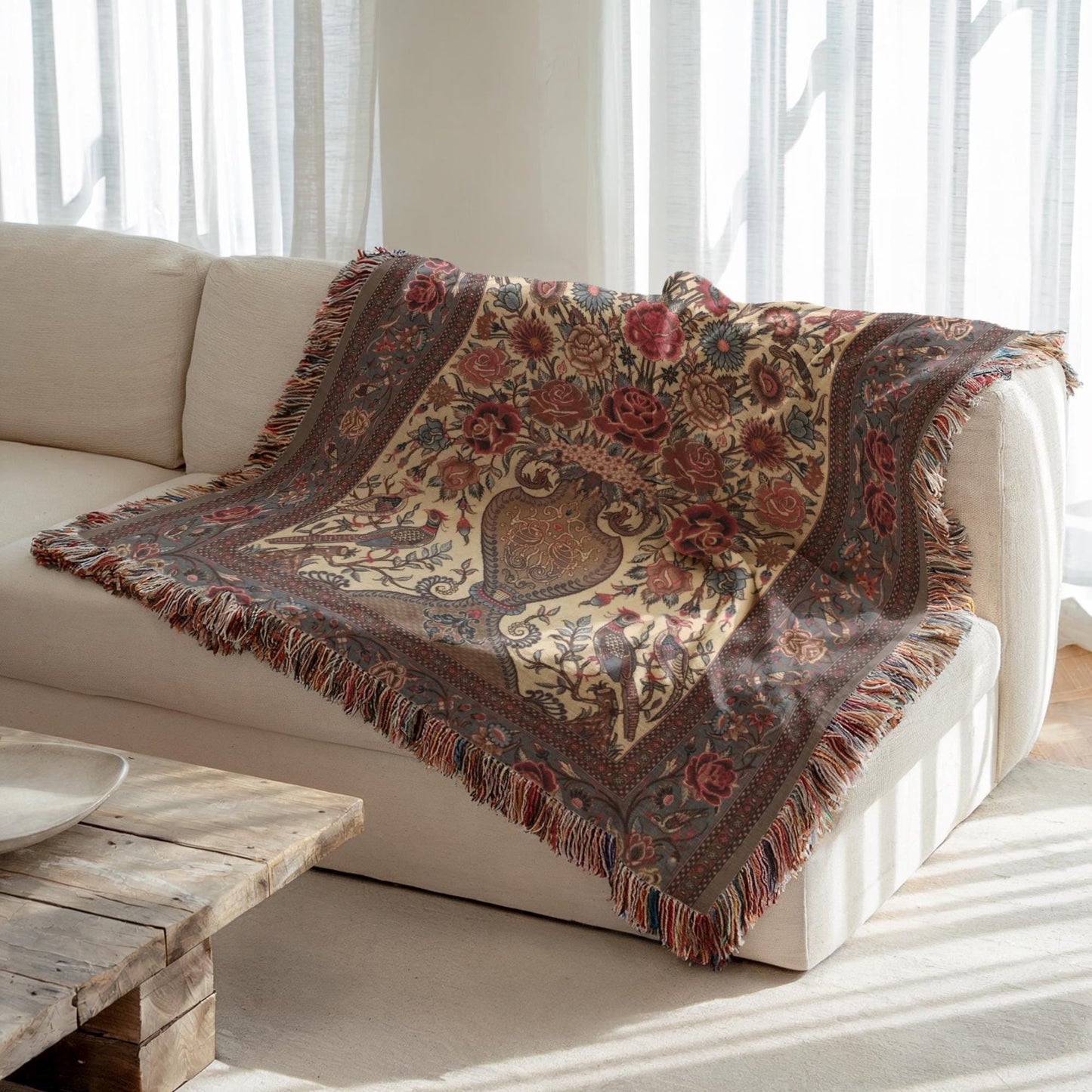 Moroccan Inspired woven blanket with floral pattern styled for layered home decor