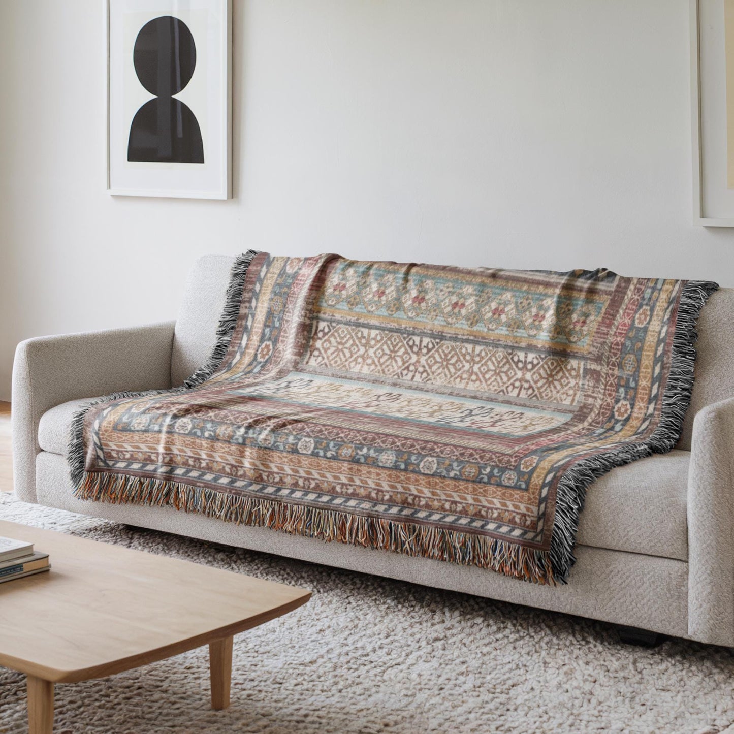 Southwestern woven blanket with geometric pattern styled for layered home decor
