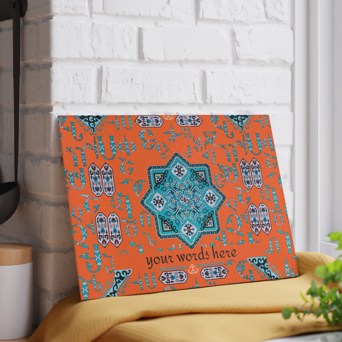 Orange and turquoise Armenian cutting board close view showing the pattern