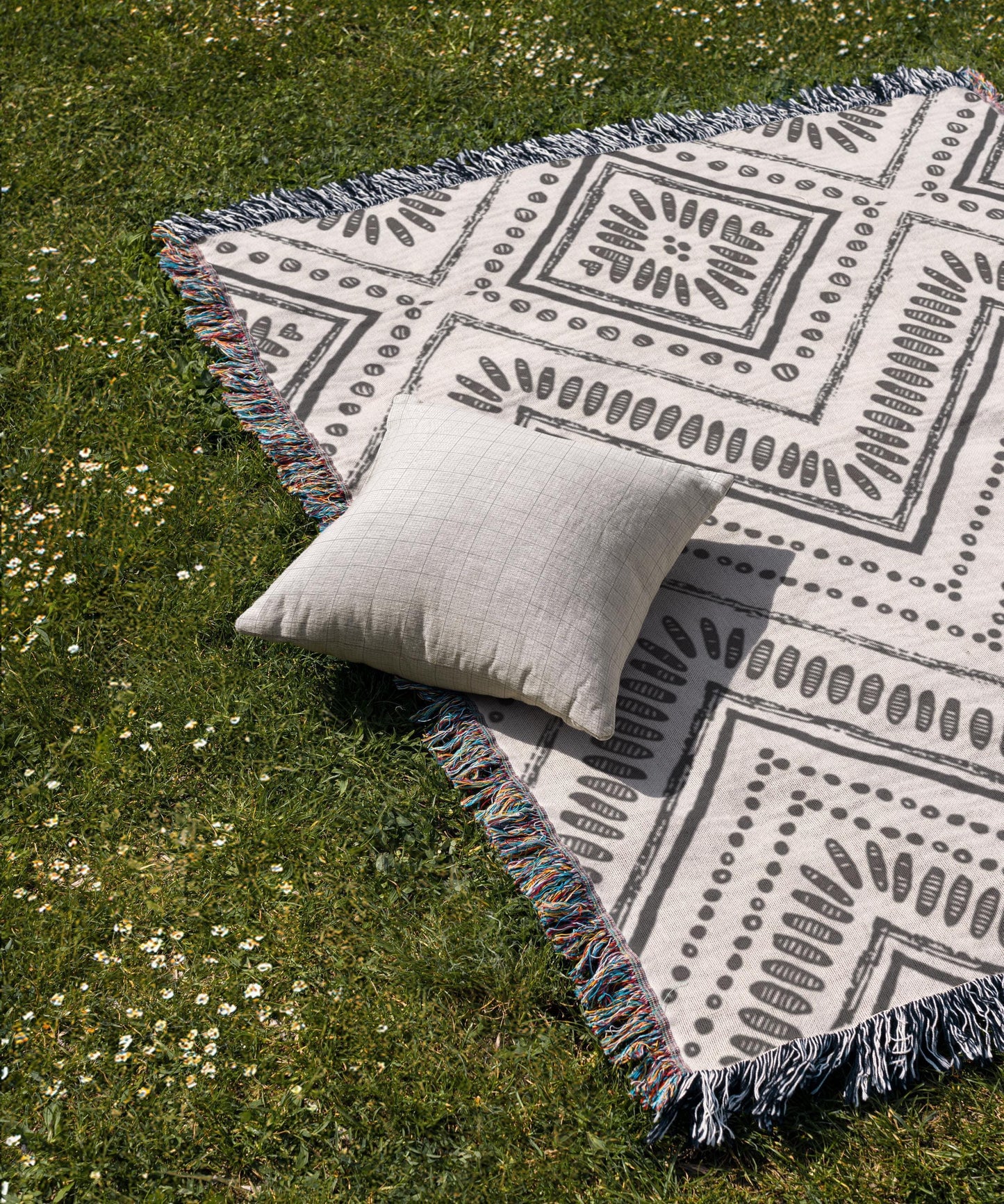 Modern Geometric pillow cover with geometric pattern styled on a sofa or bed