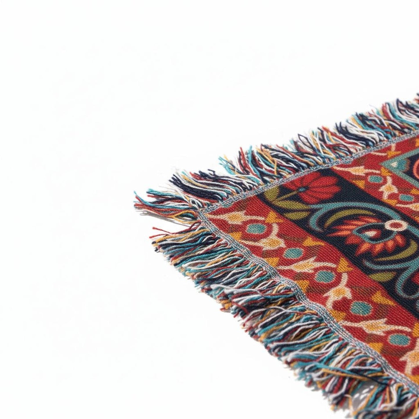 Anatolian Inspired throw pillow with rug-style pattern styled on a sofa or bed