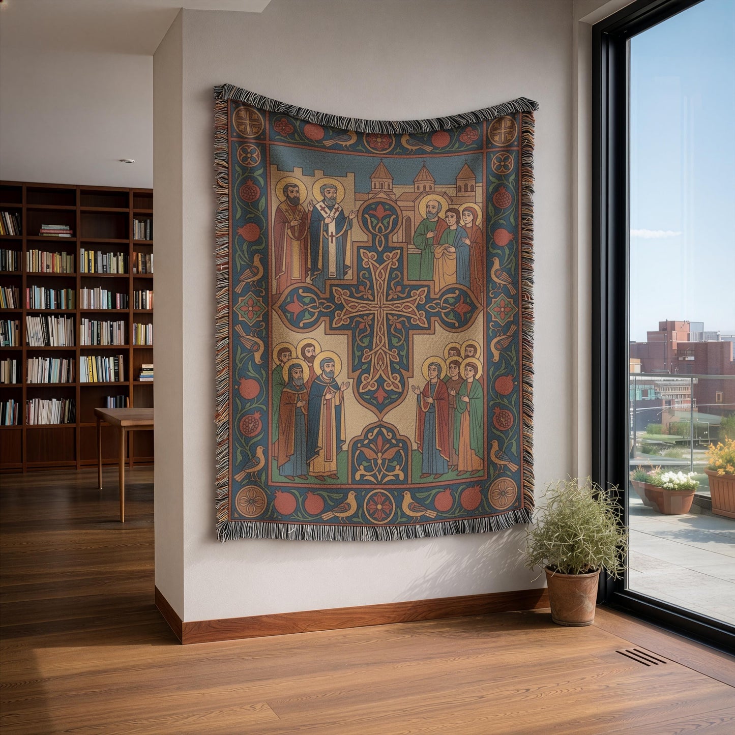 Armenian Christian wall tapestry in entry alcove, church and Mount Ararat motif, muted browns, rust and teal, potted plant below