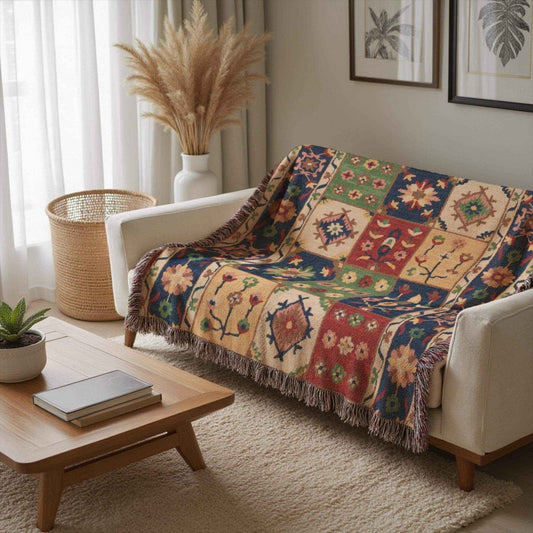 Anatolian Inspired woven blanket with floral pattern styled for layered home decor