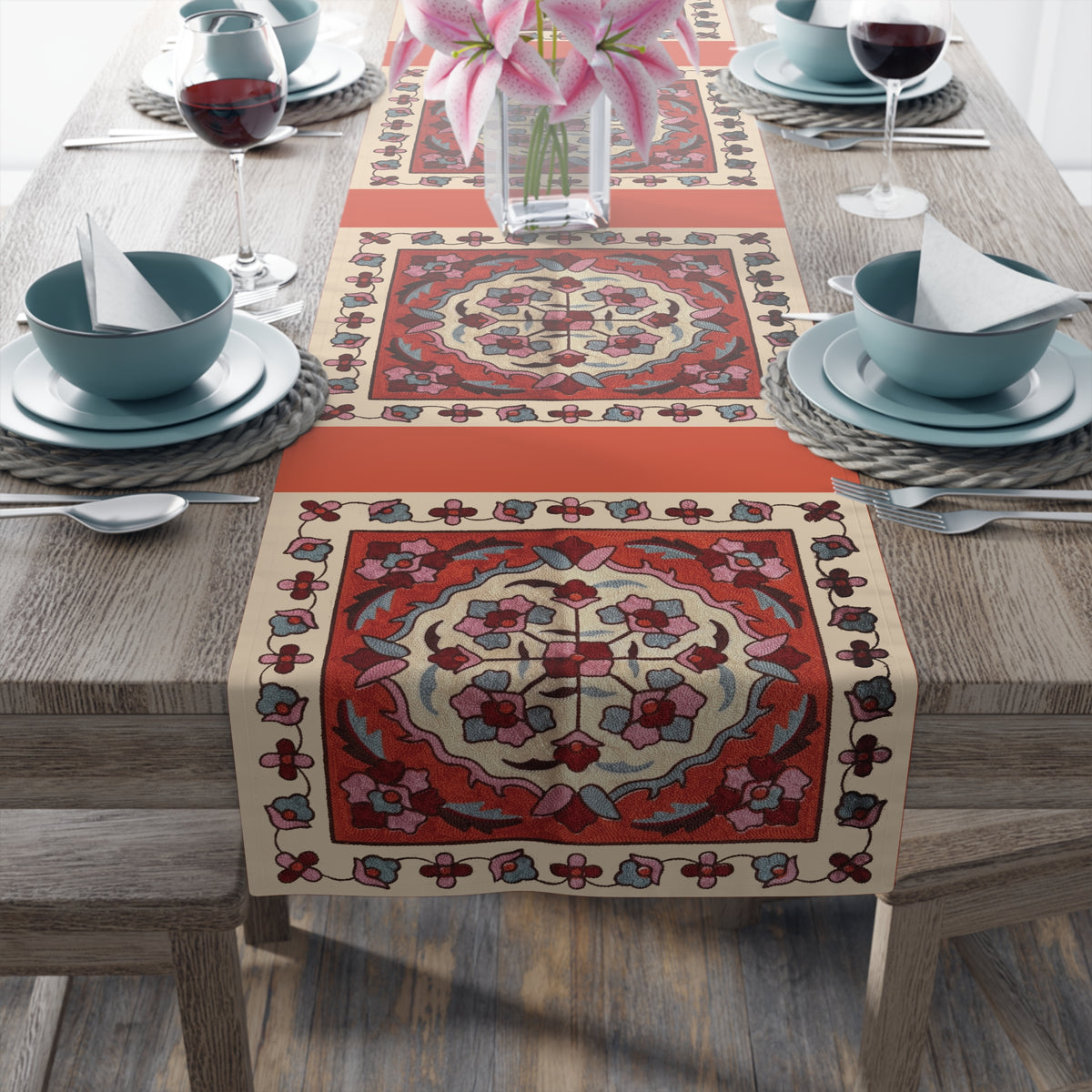 Western Armenian carpet table runner in red and cream being laid on a dining table
