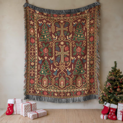 Armenian cross and Christmas tree woven blanket hung on a wall beside a Christmas tree and wrapped gifts