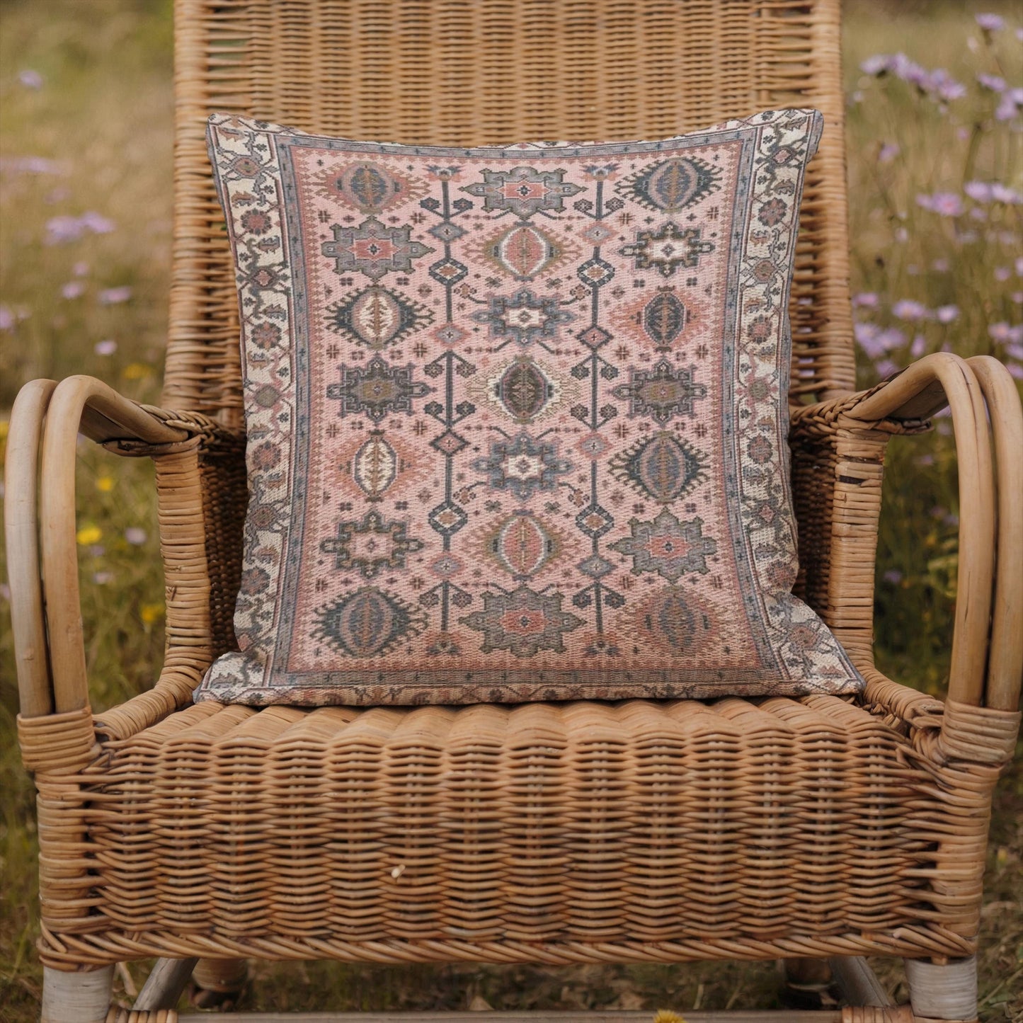 Anatolian Inspired throw pillow with rug-style pattern styled on a sofa or bed