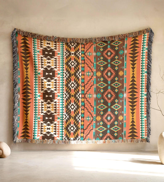 a vibrant, colorful, and patterned blanket hanging on a wall.