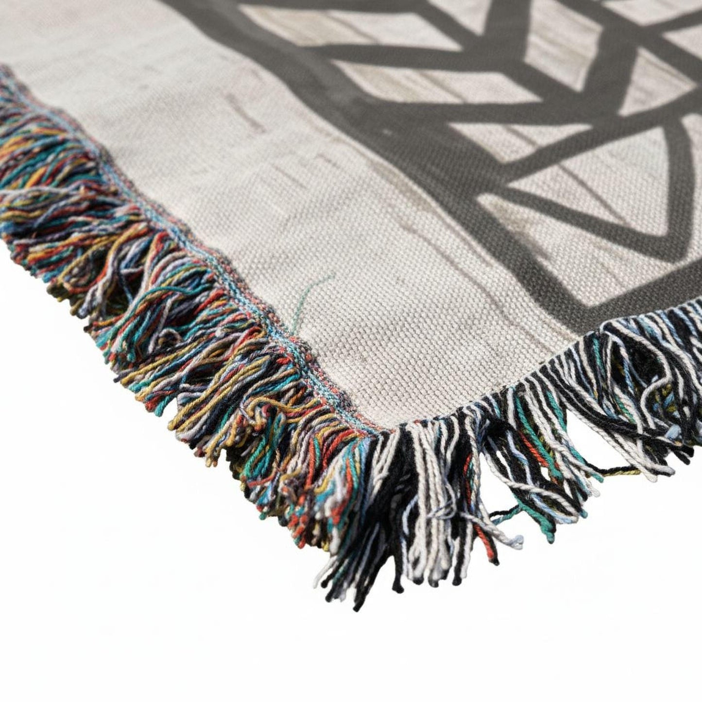 Modern Geometric woven blanket with geometric pattern styled for layered home decor