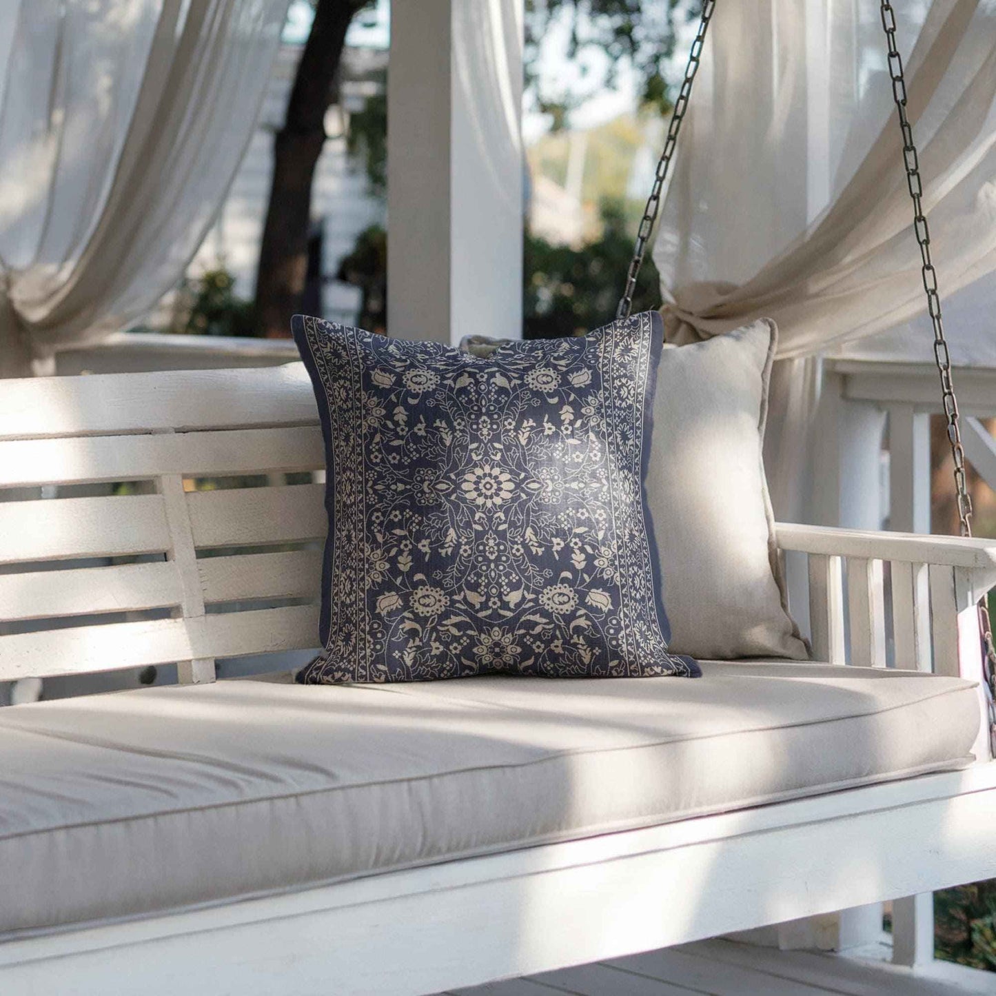 Moroccan Inspired throw pillow with floral pattern styled on a sofa or bed