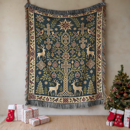 Armenian deer and pomegranate blanket hung on a wall beside a Christmas tree and wrapped gifts