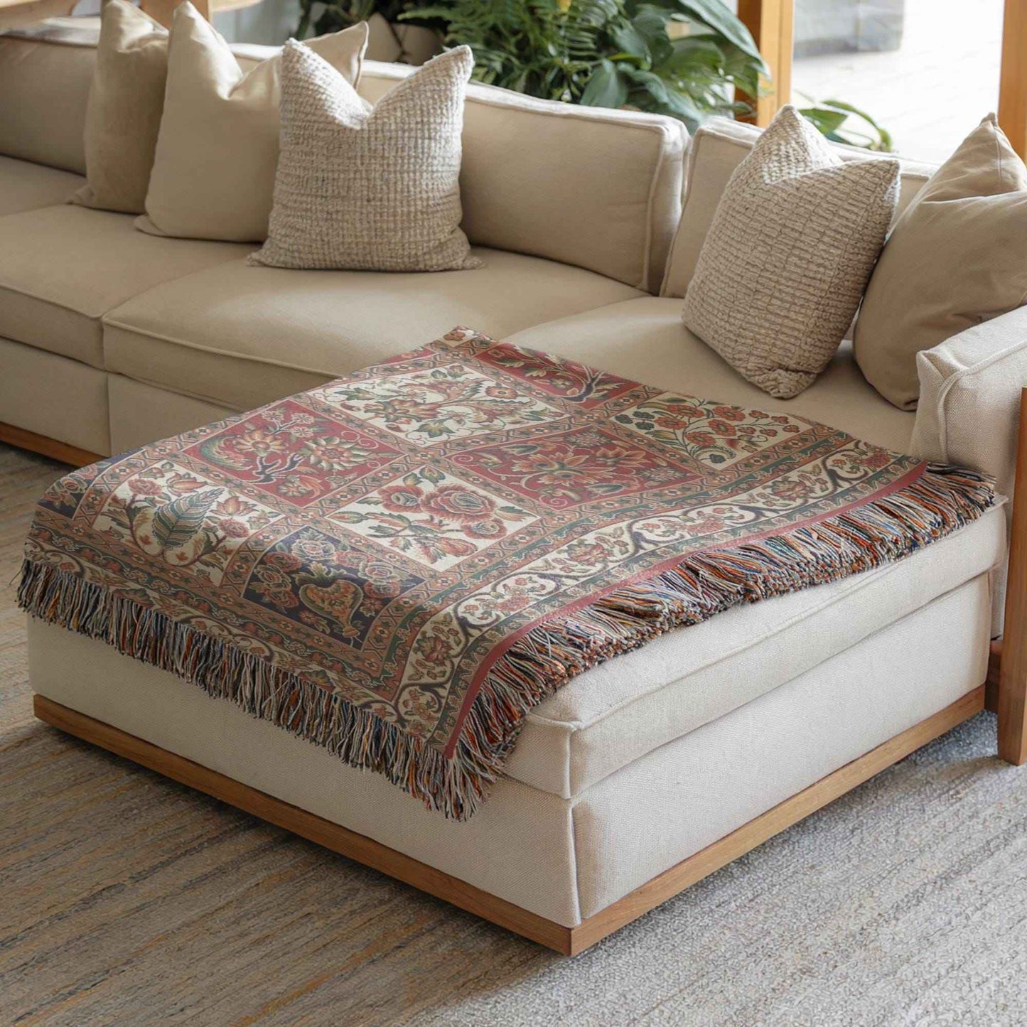 Anatolian Inspired woven blanket with floral pattern styled for layered home decor