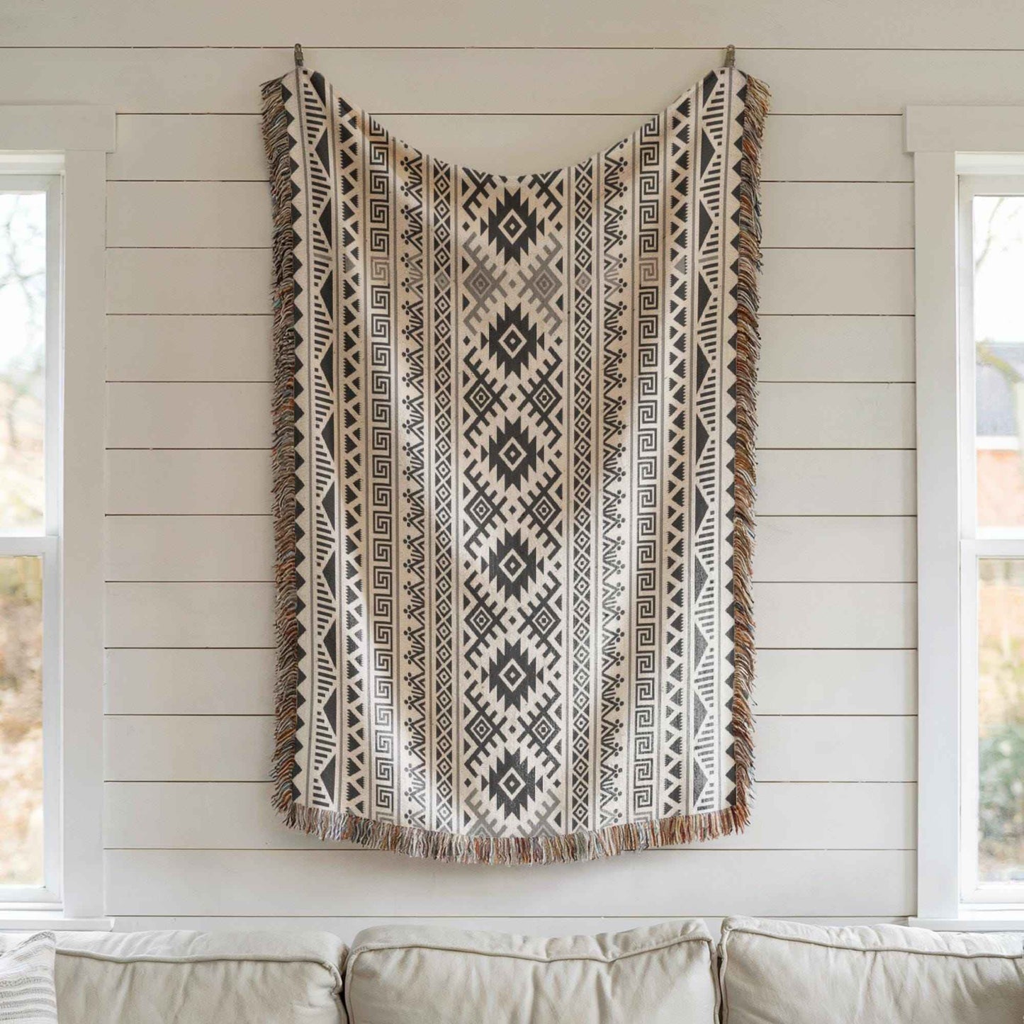 Southwestern woven wall tapestry with geometric pattern styled as textile wall decor