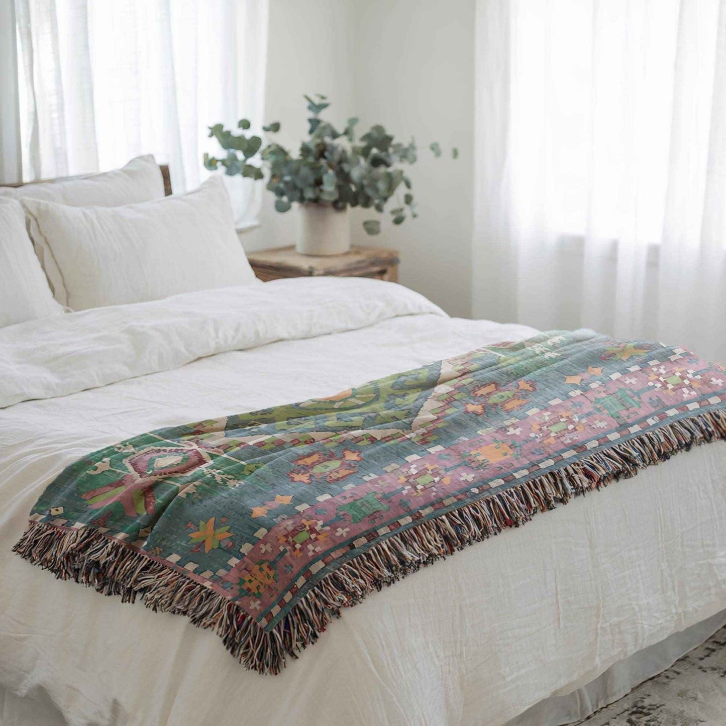 Moroccan Inspired woven blanket with woven pattern styled for layered home decor