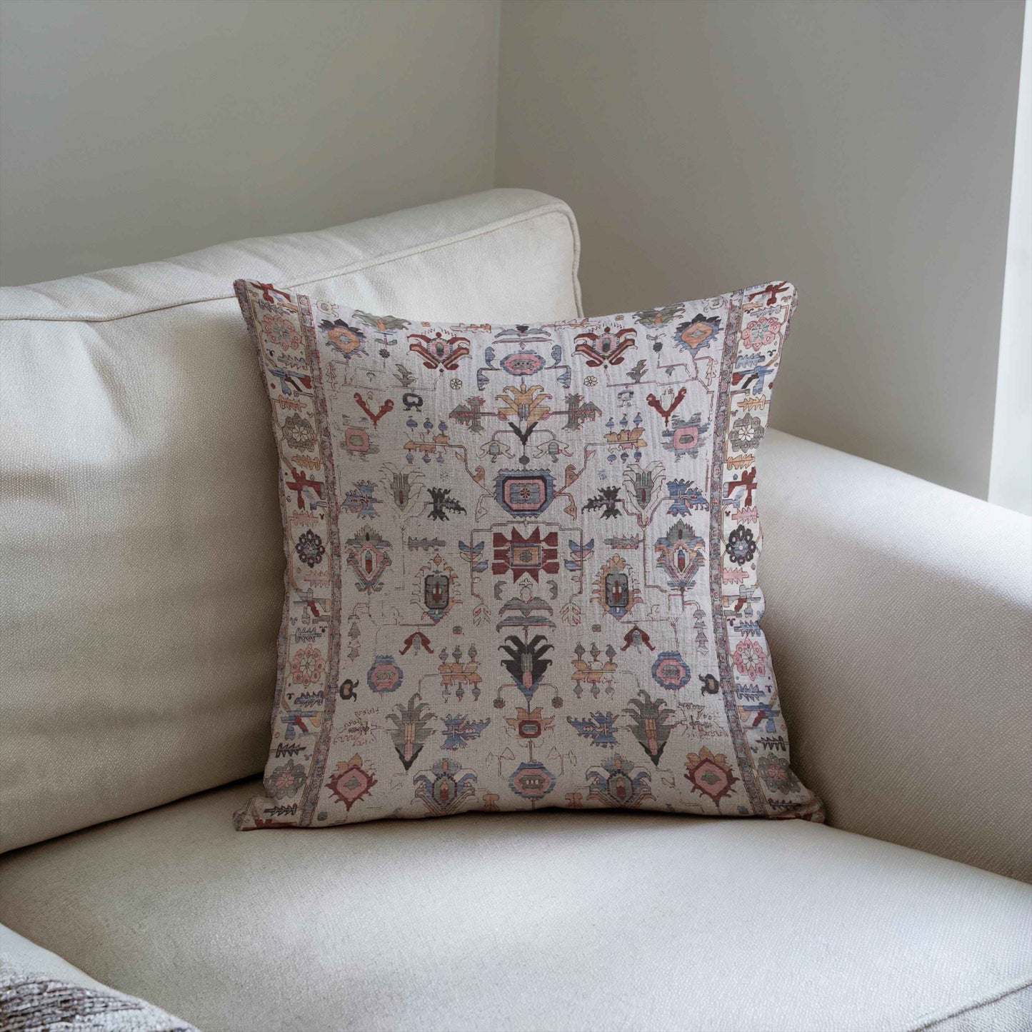 Anatolian Inspired pillow cover with rug-style pattern styled on a sofa or bed