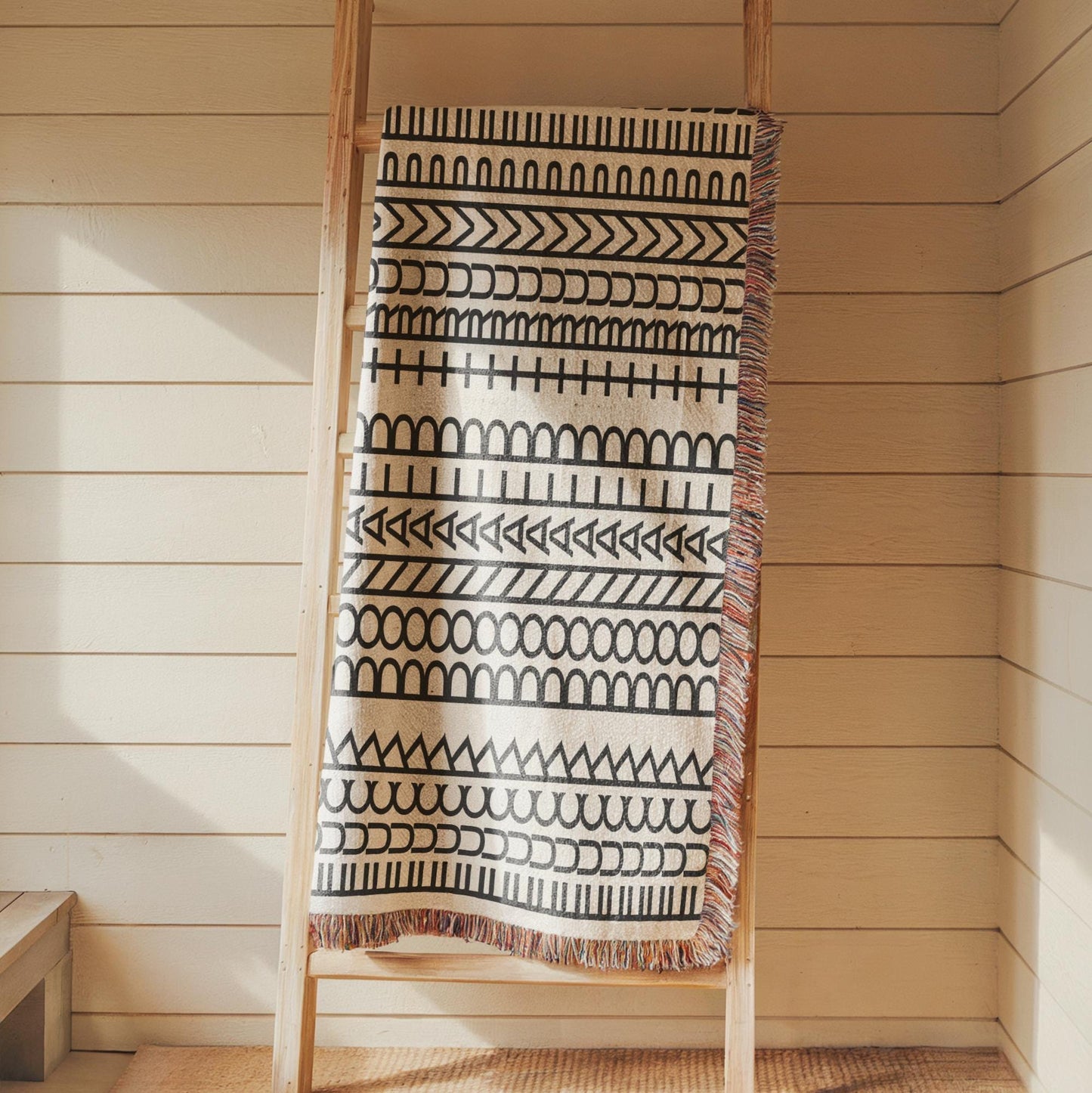 Modern Geometric woven blanket with geometric pattern styled for layered home decor