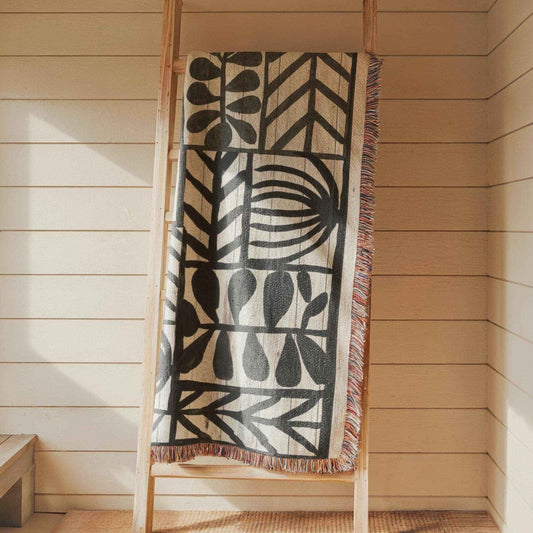 Modern Geometric woven wall tapestry with geometric pattern styled as textile wall decor