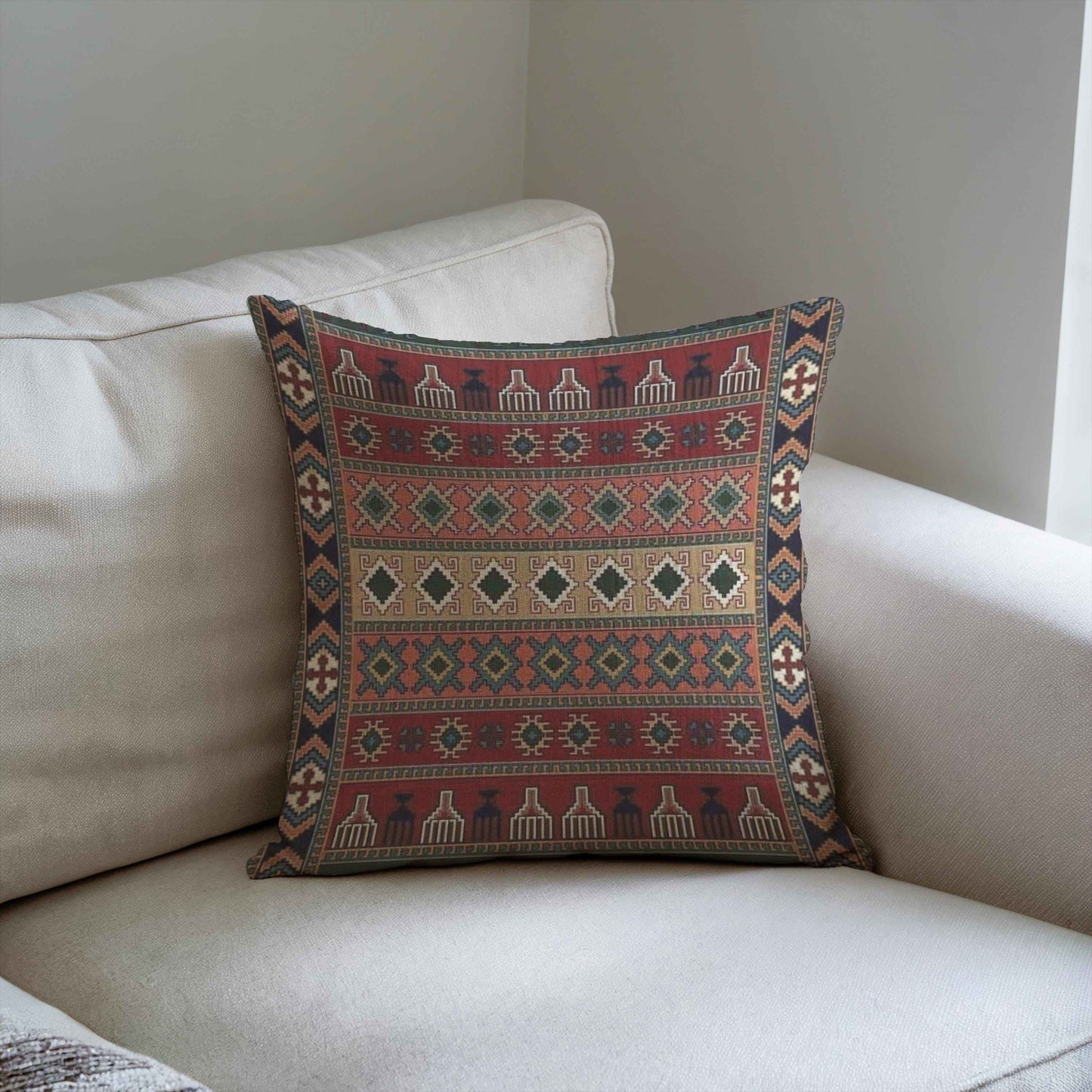 Anatolian Inspired pillow cover with rug-style pattern styled on a sofa or bed