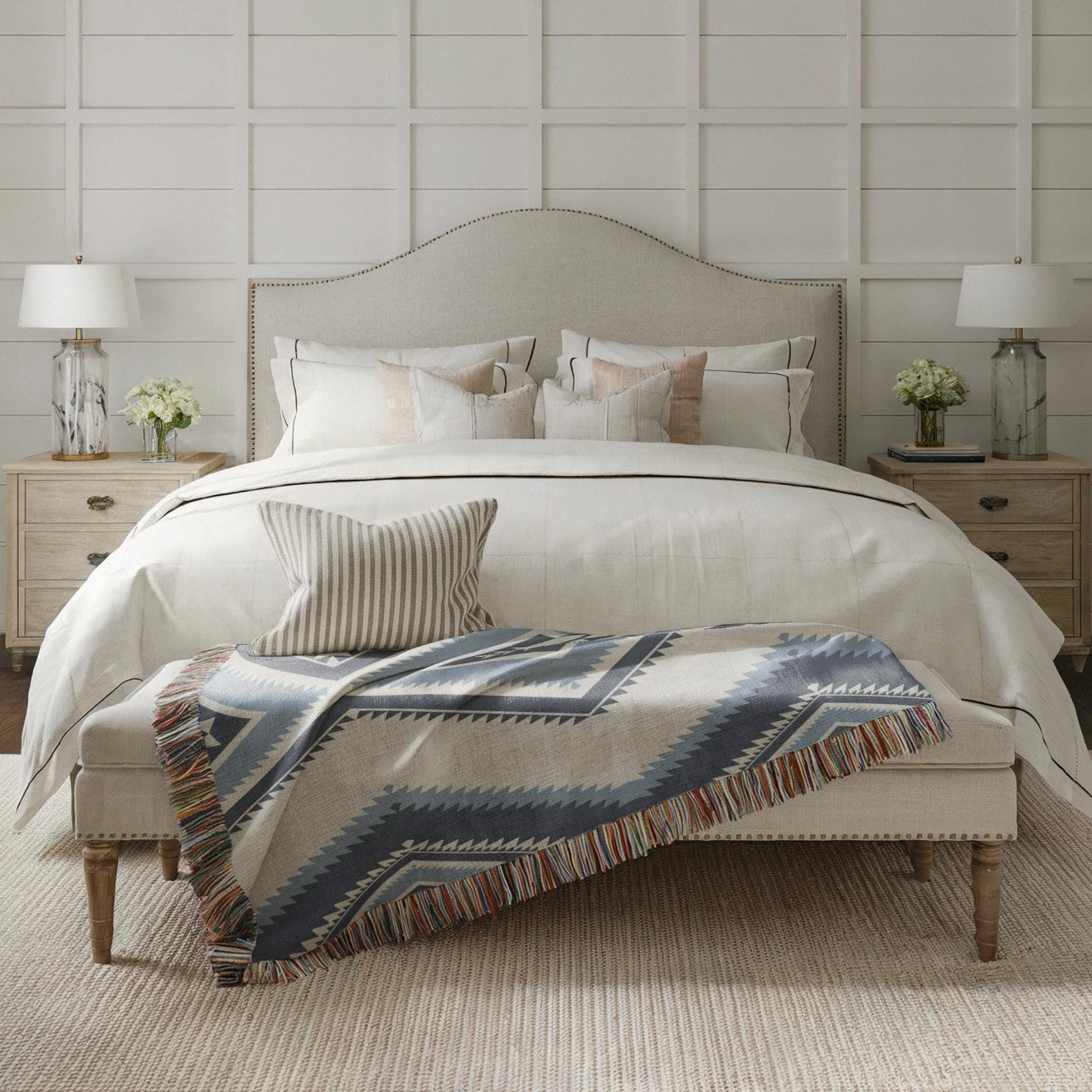 Southwestern woven blanket with geometric pattern styled for layered home decor