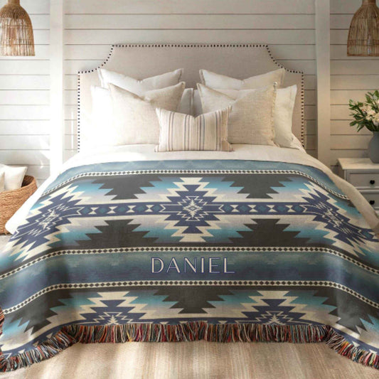 Southwestern woven blanket with geometric pattern styled for layered home decor