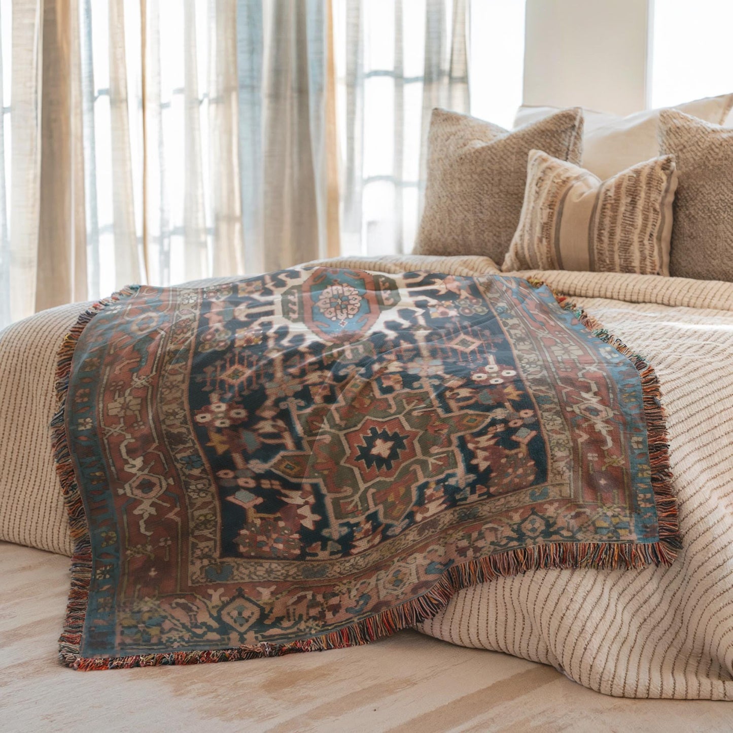 Anatolian Inspired woven blanket with rug-style pattern styled for layered home decor