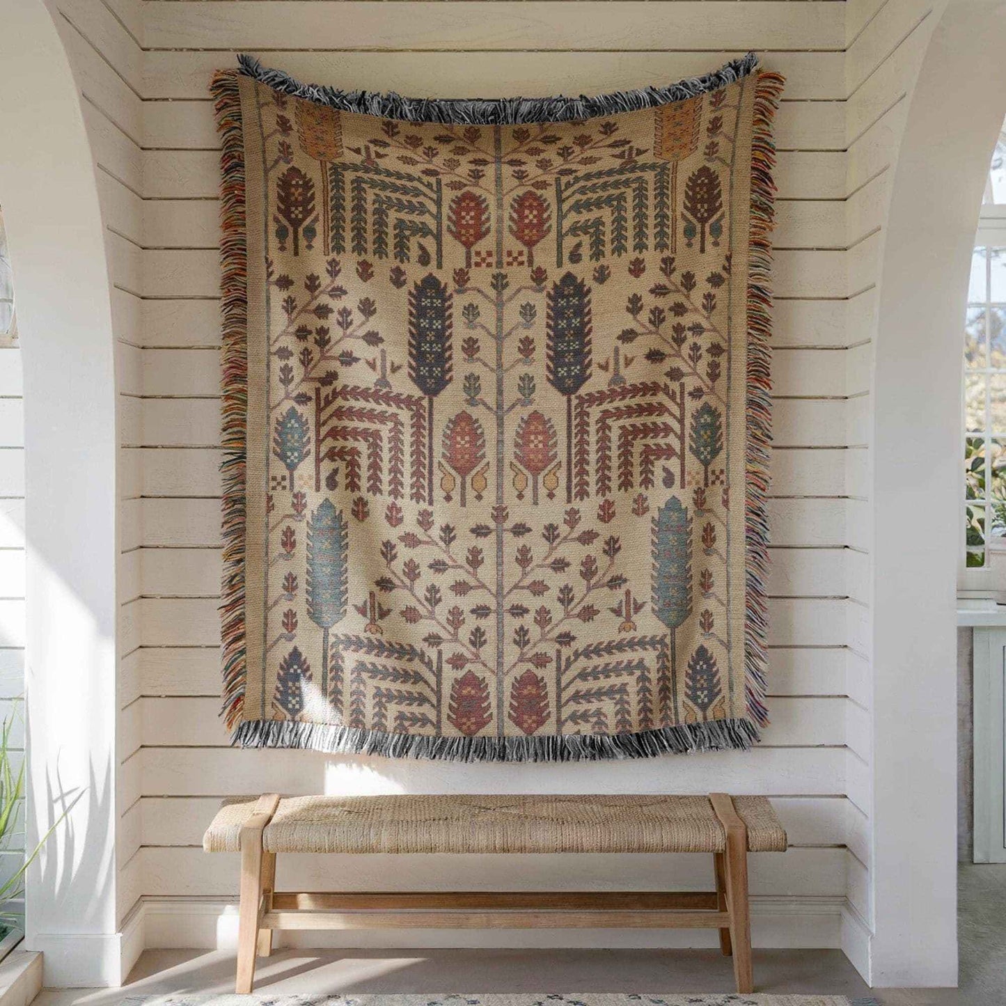 Caucasian Rug Inspired woven wall tapestry with geometric pattern styled as textile wall decor