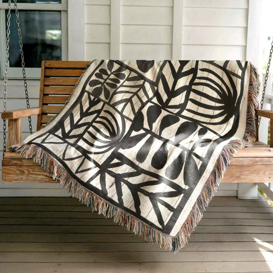 Modern Geometric woven blanket with geometric pattern styled for layered home decor