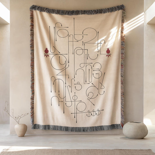 Armenian alphabet woven wall tapestry in black and white with red floral accents