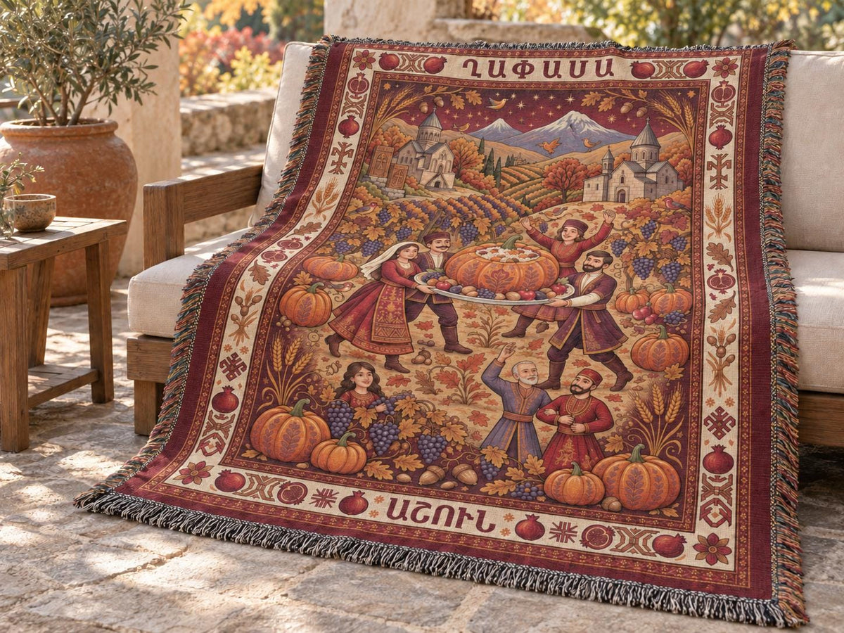 Family Ghapama cotton throw draped over covered patio seating, showing the Armenian harvest scene, softened colours and fringed edges.