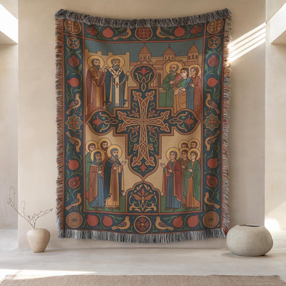 Armenian Christian wall tapestry close view, ornate cross with surrounding saints, cream, rust and teal details, floor vases