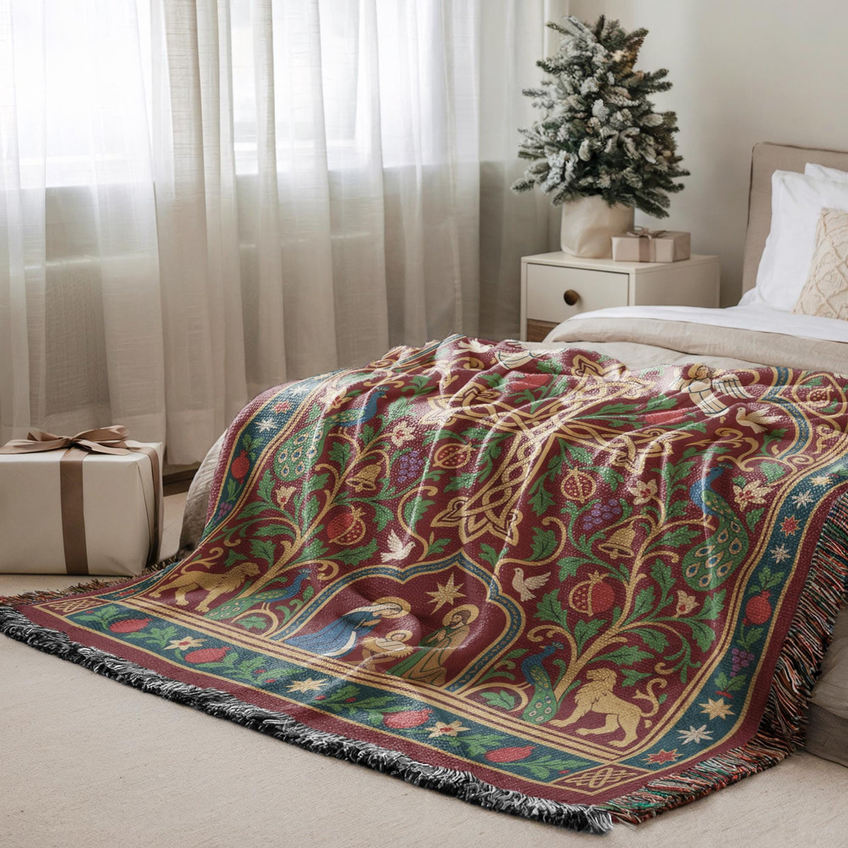 a cozy bedroom scene with a large, colorful, and intricately patterned blanket on a bed, a small Christmas tree, and a gift box on the floor.