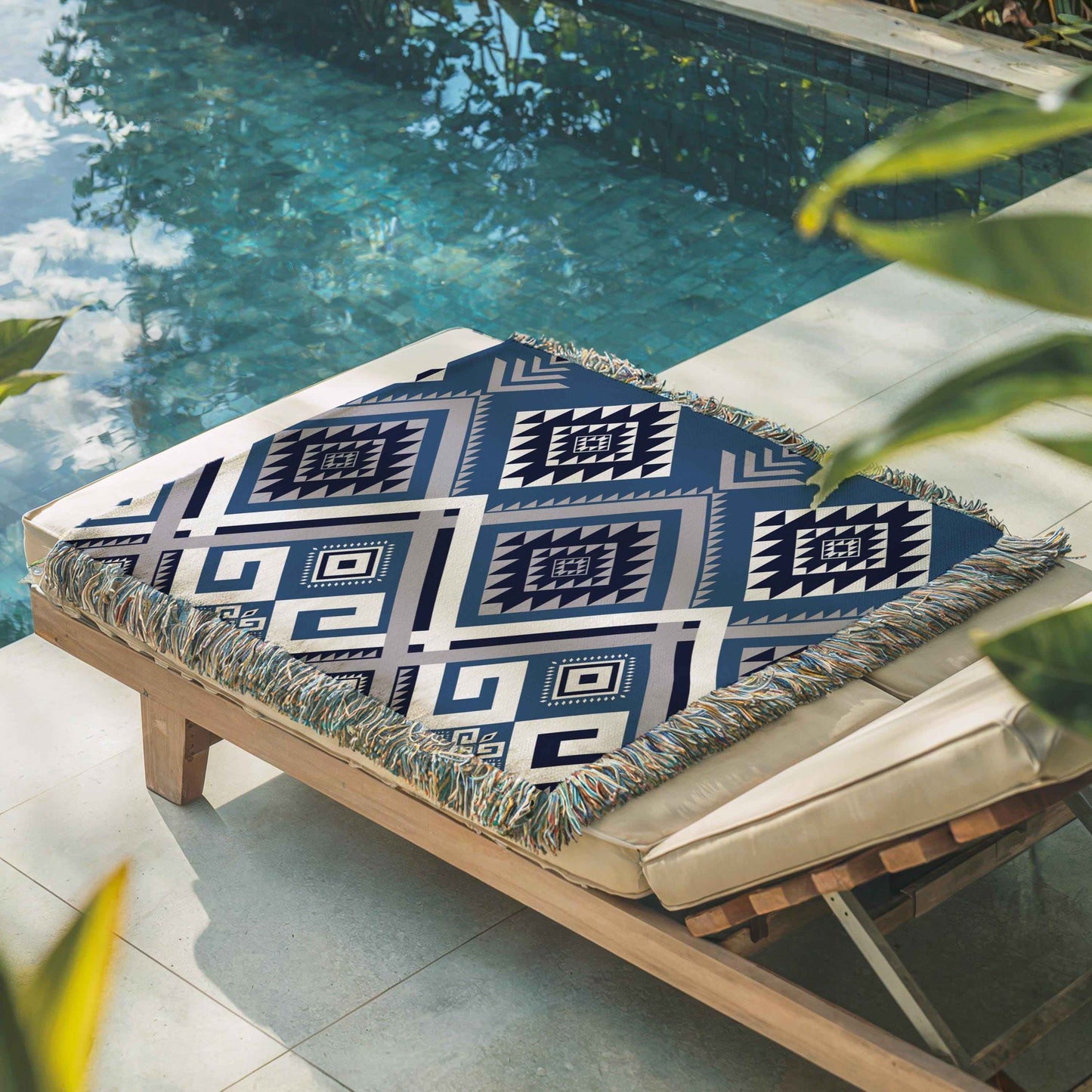 Southwestern outdoor woven throw blanket with geometric pattern for patio styling