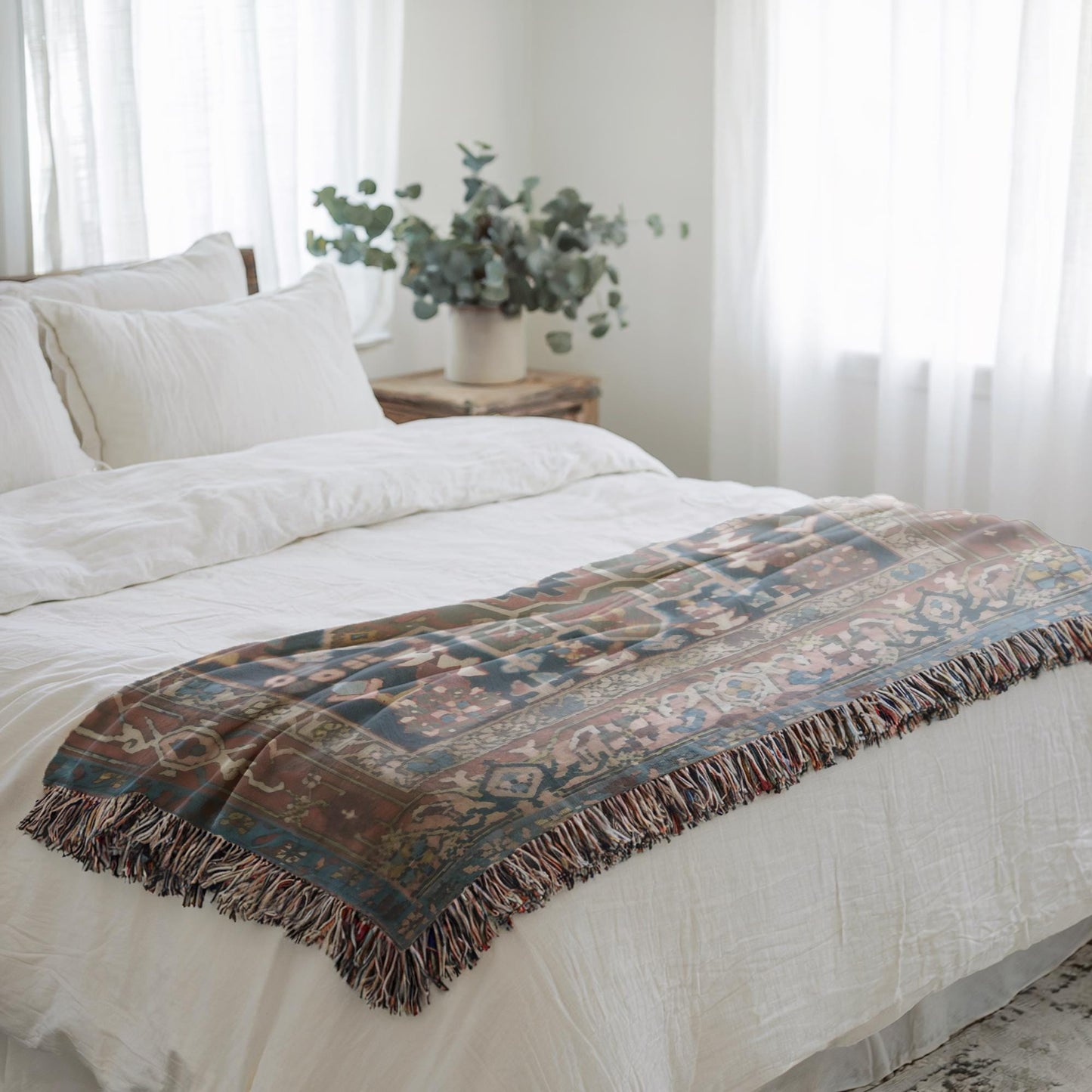 Anatolian Inspired woven blanket with rug-style pattern styled for layered home decor