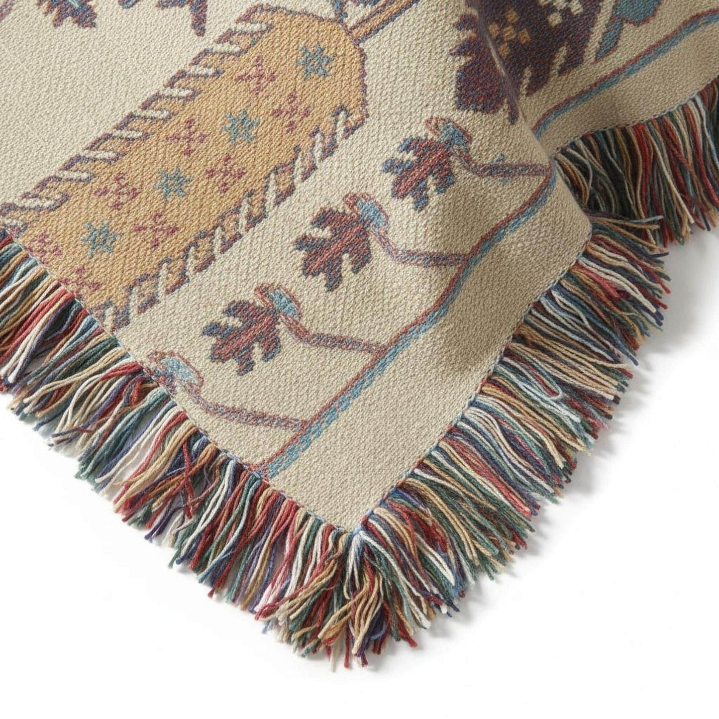 Anatolian Inspired woven blanket with rug-style pattern styled for layered home decor