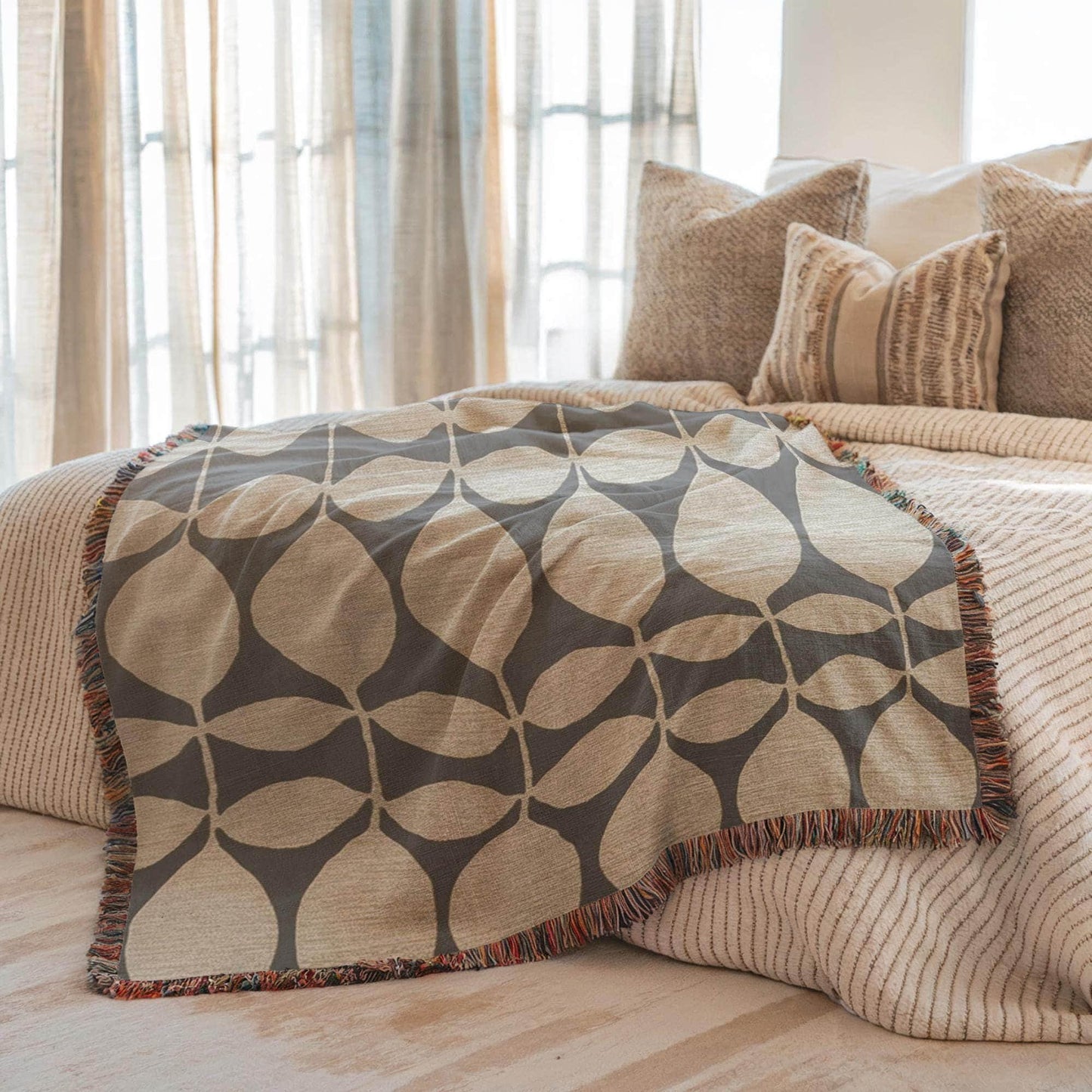 Modern Geometric woven blanket with geometric pattern styled for layered home decor