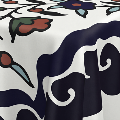 Close view of the deep navy wavy border with rust tulips and sage leaves on white