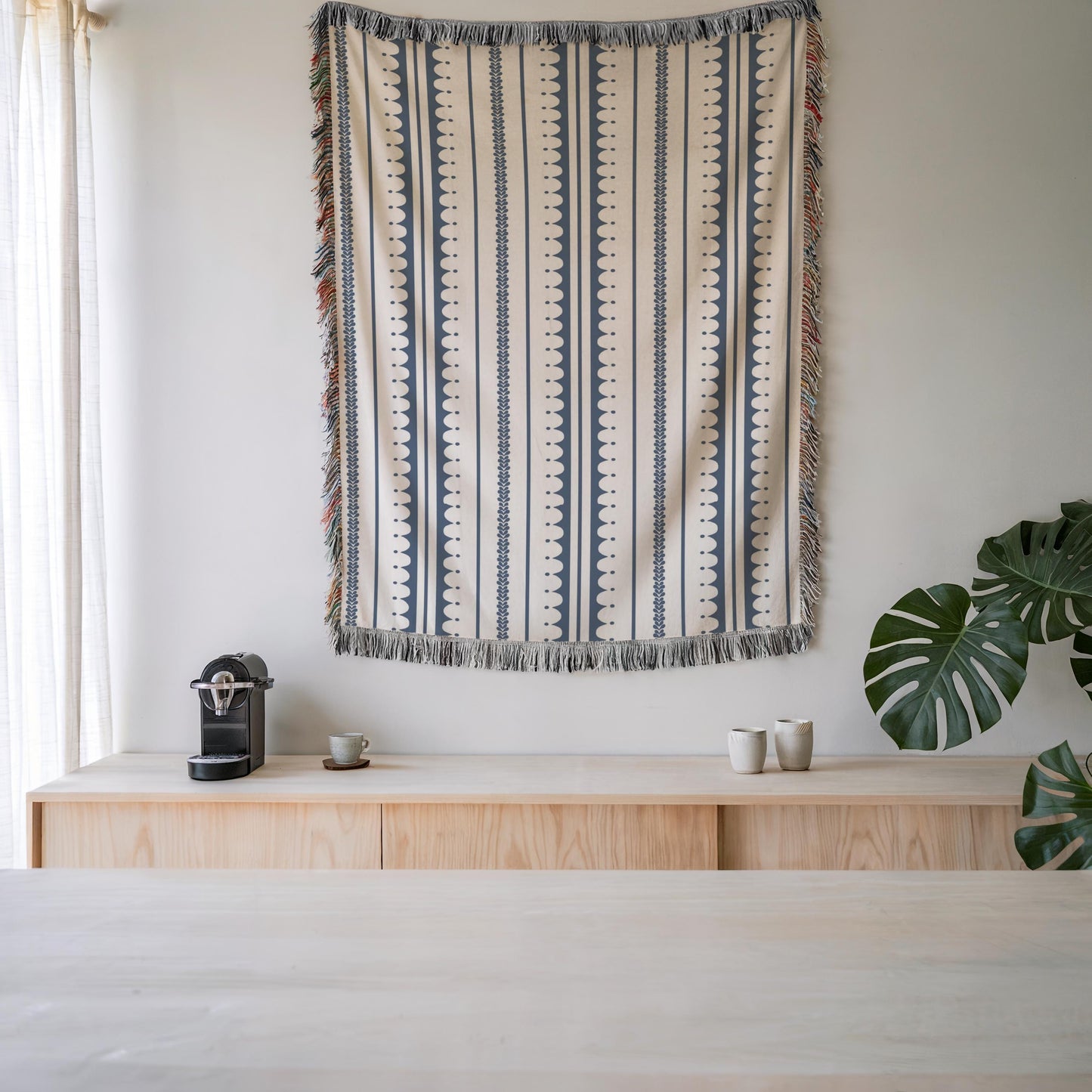 Modern Geometric woven blanket with geometric pattern styled for layered home decor