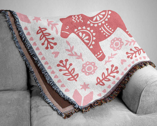 Scandinavian Inspired woven blanket with woven pattern styled for layered home decor